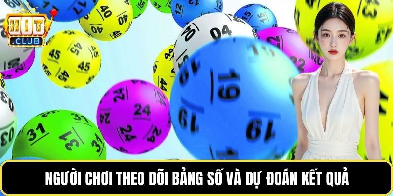 Người chơi theo dõi bảng số và dự đoán kết quả